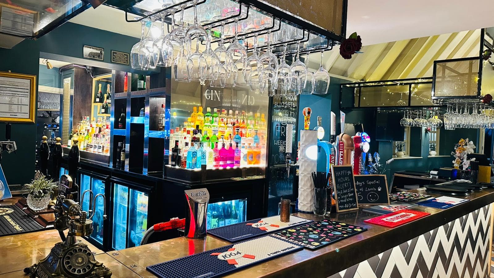 Historic thatched interior of The Old Crown Girton featuring authentic Nepalese dining in Cambridge's most characterful pub